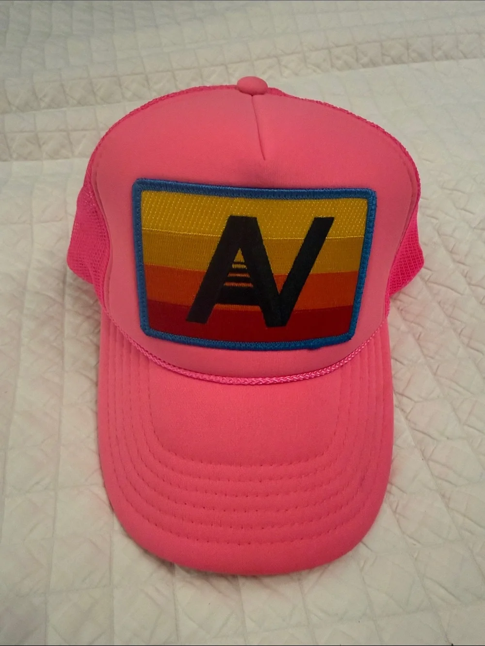 Women’s hot Pink Trucker Hat with Colorful Patch